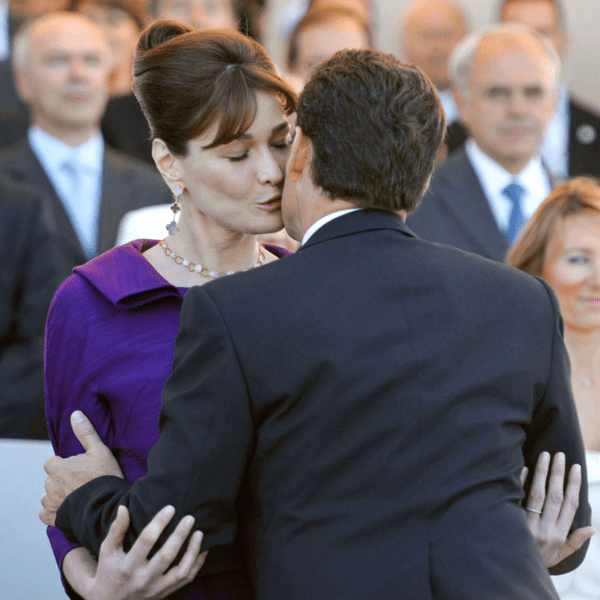 CARLA &amp; HUSBAND NICHOLAS KISSING