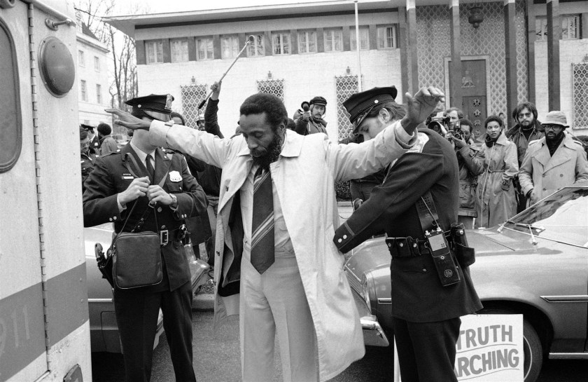 DICK GREGORY, BEING ARRESTED IN 1977 OUTSIDE THE SOUTH AFRICAN EMBASSEY IN WASHINGTON DCjpg