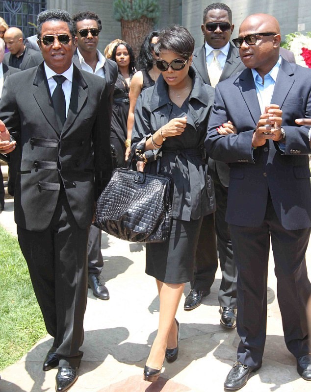 JANET WITH A HERMES BAG