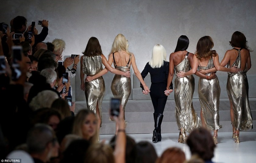 NAOMI CAMPBELL &amp; THE REST OF THE GOLDEN GIRLS ALONG WITH DONATELLA VERSACE WITH THEIR BACKS TURNED ON THE CATWALKI