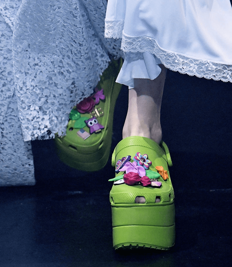 BALENCIAGA MODEL WEARING GREEN CROCS WITH ACCESSORIES .png.jpg
