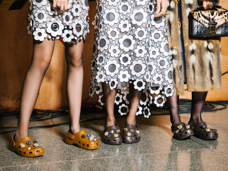 BALENCIAGA MODELS WEARING CROCS IN THEIR LACE DRESSES .png.jpg