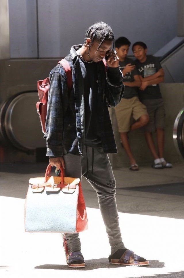 HERMES, TRAVIS SCOTT WEARING HERMES TRI - COLOR OSTRICH SKIN BAG