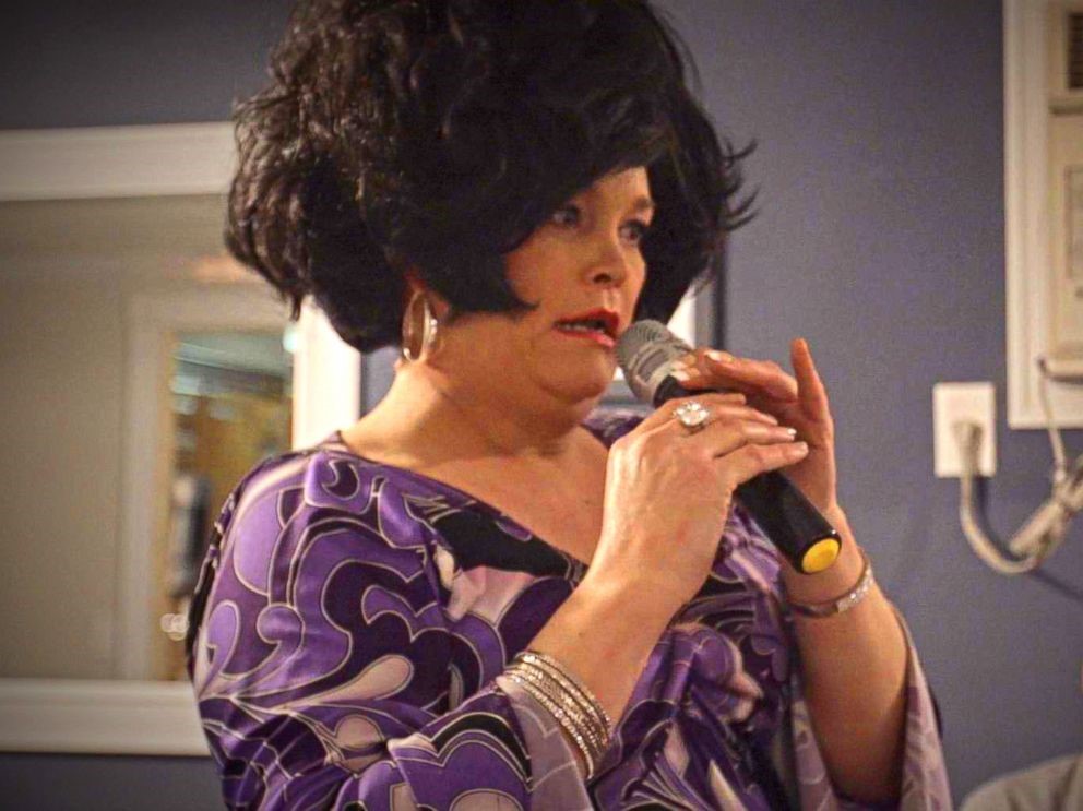 JENNIFER HOSTING A PARTY AS THE CHARACTER SHE PRODUCED, “AUNT BARBARA”