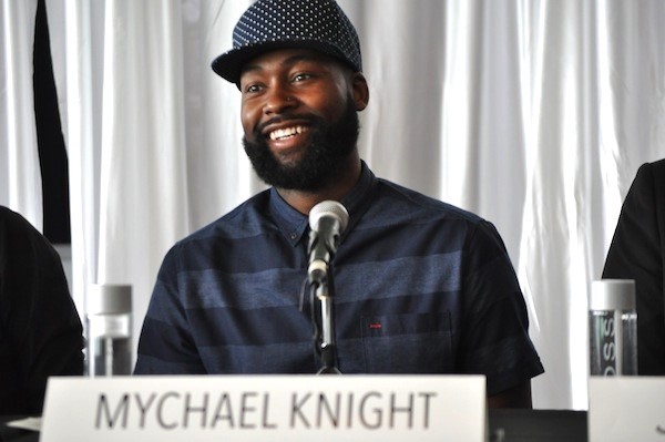 MICHAEL KNIGHT WITH HIS NAME IN FRONT OF HIM