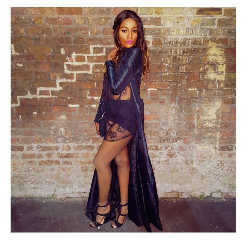 NIGERIAN FEMALE ARTIST DEBORAH ‘SEYI SHAY_ OLUWASEYI IN A PURPLE DRESS