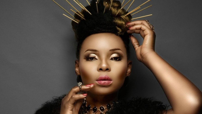 NIGERIAN FEMALE ARTIST YEMI ALADE WITH WOODEN SPIIKES IN HER HAIR