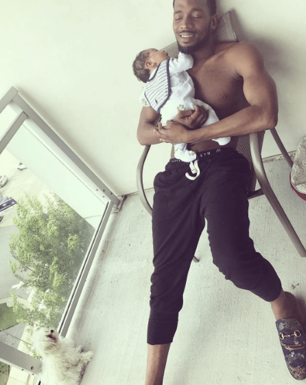 NIGERIAN MALE ARTIST D`BANG AND HIS NEWBORN PHOTO
